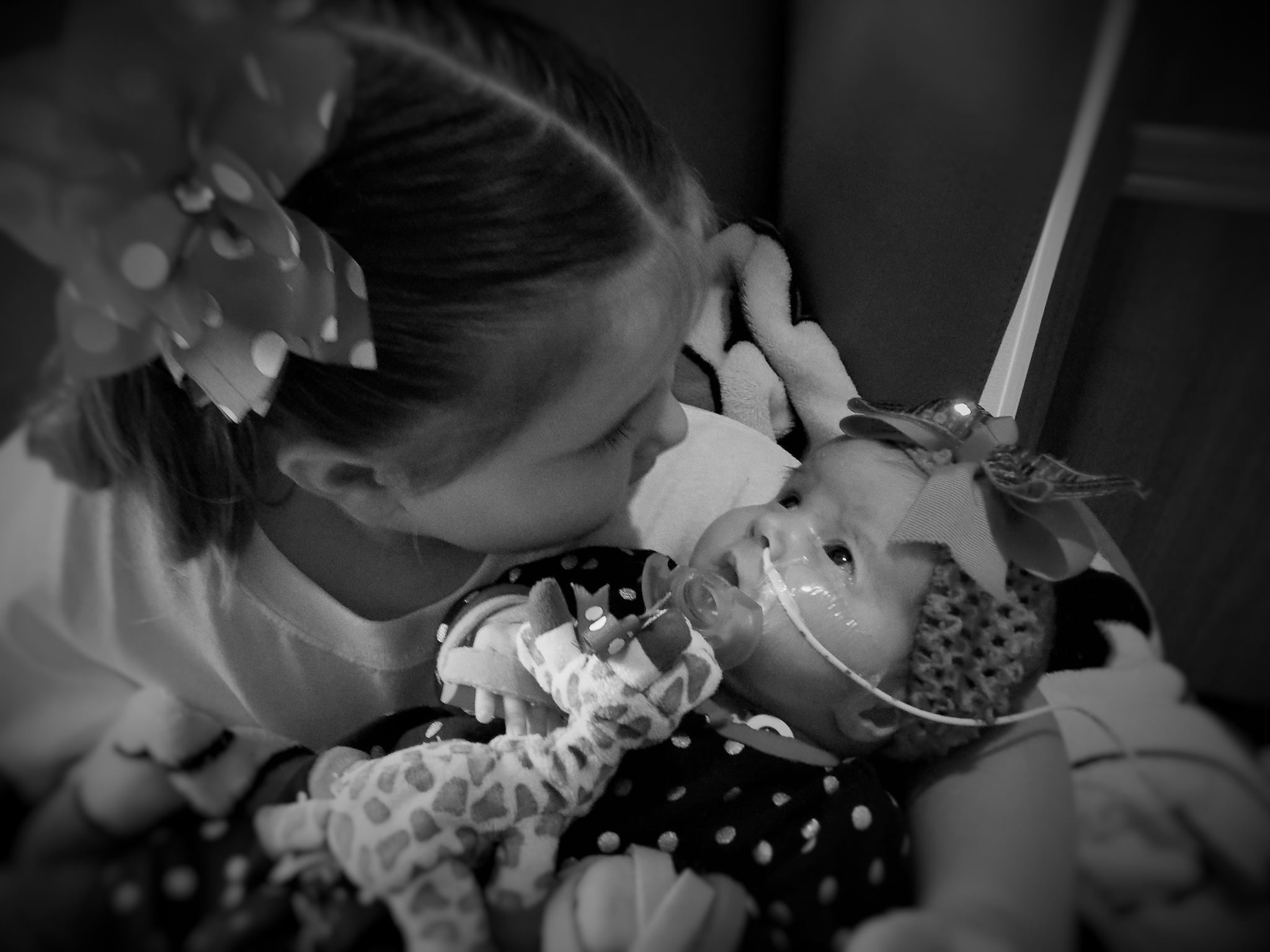 Riley holding Raegan