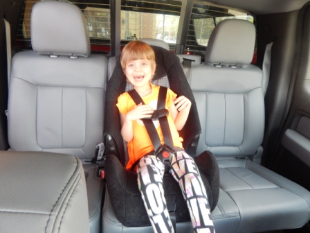 Raylee enjoying her new car seat