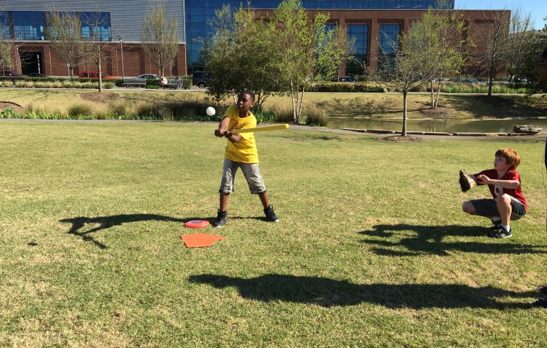 Kids play baseball