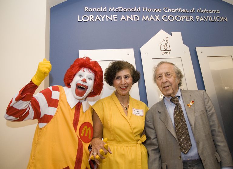 Ronald, Marianne Sharbel and Max Cooper pose together