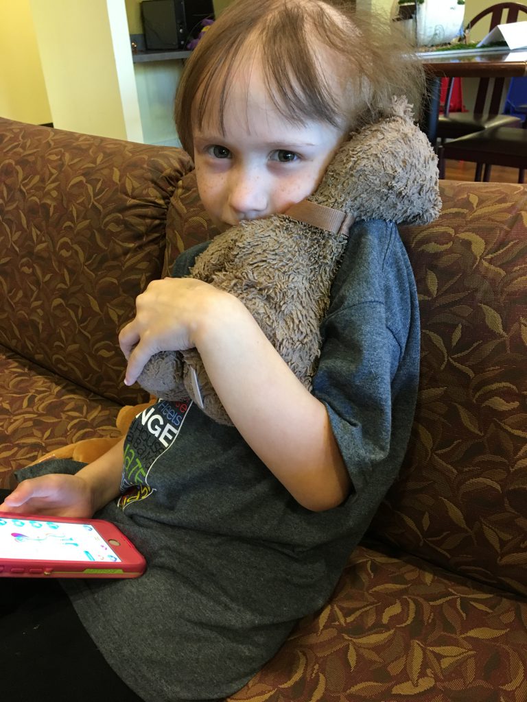 Mollie with her teddy bear