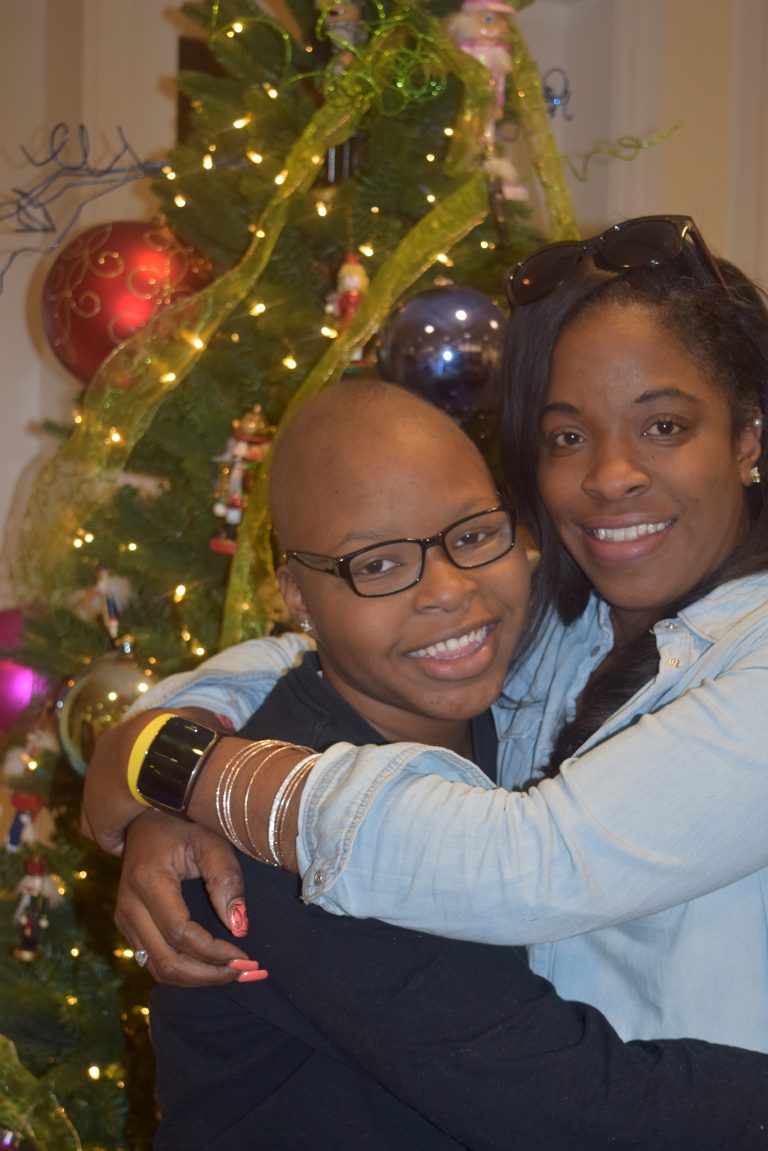 A mother and daughter enjoy the Christmas Party