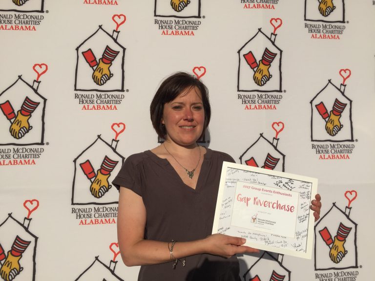 Allison accepts the Group Events Enthusiasts award for Gap Riverchase