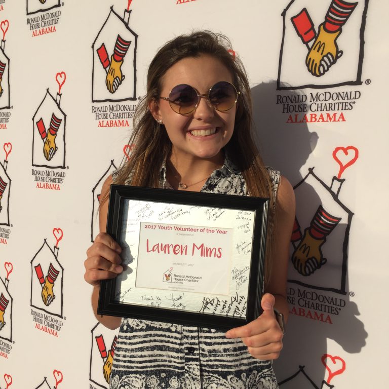 Lauren accepts her award as Youth Volunteer of the Year