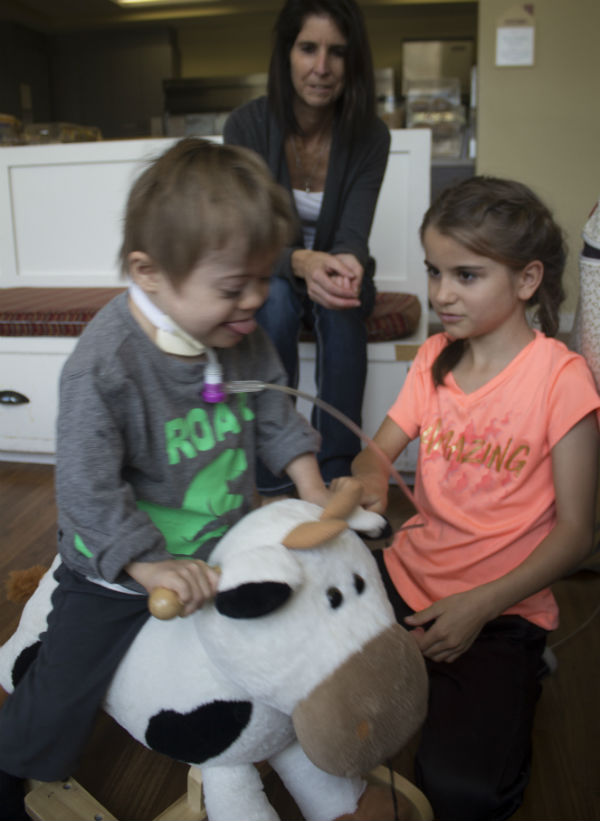 L-R: Jace, Jamie and Josie play at the House.