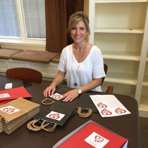 Jeannie helps RMHCA prepare for the 2018 Red Shoe Run.