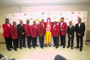 Owner/operator Dale Thornton Jr. (left of Ronald) and the Alpha Kappa Psi Fraternity. Source: Ven Sherrod