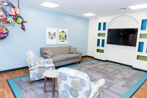 Parents can read or watch TV in the Family Room common area.