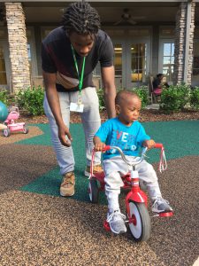 Demarius Hollis and Cade Hollis on the playground.