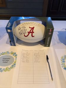 This football signed by Nick Saban was the most sought-after auction item!