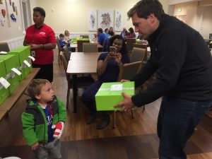 Santi and dad receive their Cheeriodicals box.