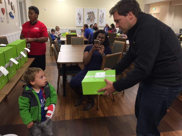 Santi and dad receive their Cheeriodicals box.