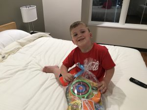 Trenton relaxes in the family's guest room at the Ronald McDonald House.