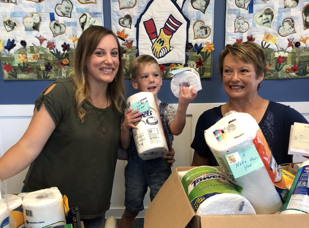 Hannah and Carter Sparks show off their Wish List donation