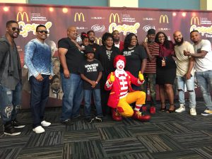 The White family poses with the tour artists and Ronald McDonald.