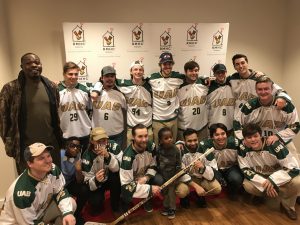 Cleo and Geo get to meet the UAB Hockey team at the Ronald McDonald House.
