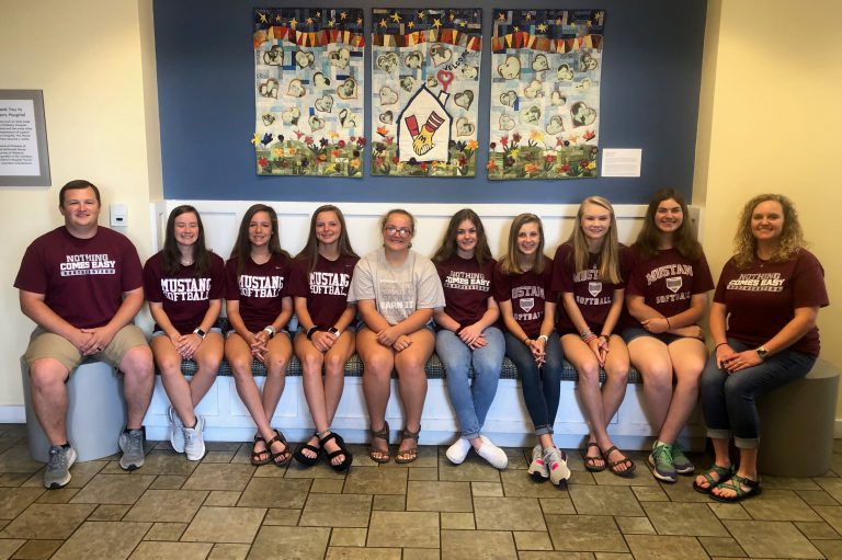 Mr. and Mrs. Chapman with the Southeastern School softball team.