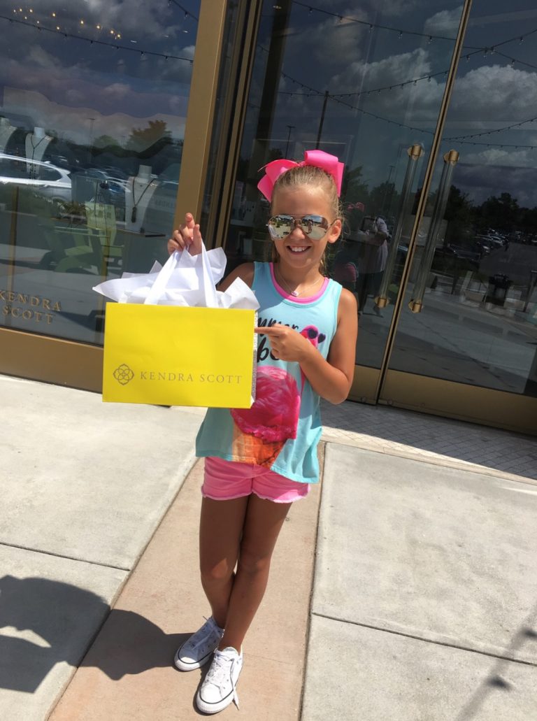 Natalie Kate outside of Kendra Scott