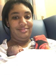 Esha holds Deon.