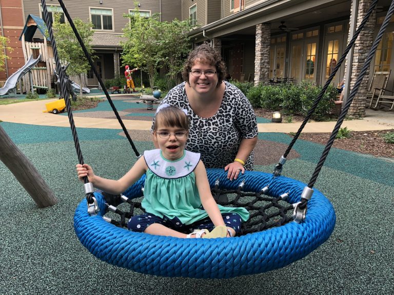 Emma Kate and Susan enjoy the playground.