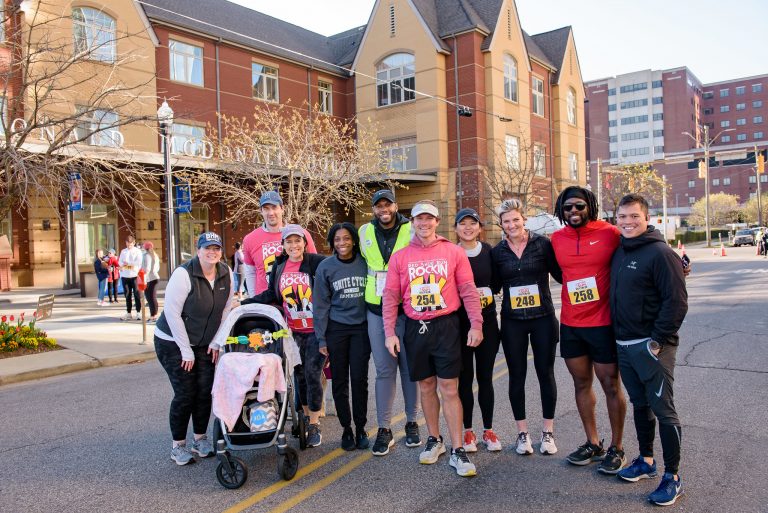 A group of friends in running gear.