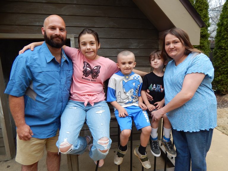 A man, woman and their three children