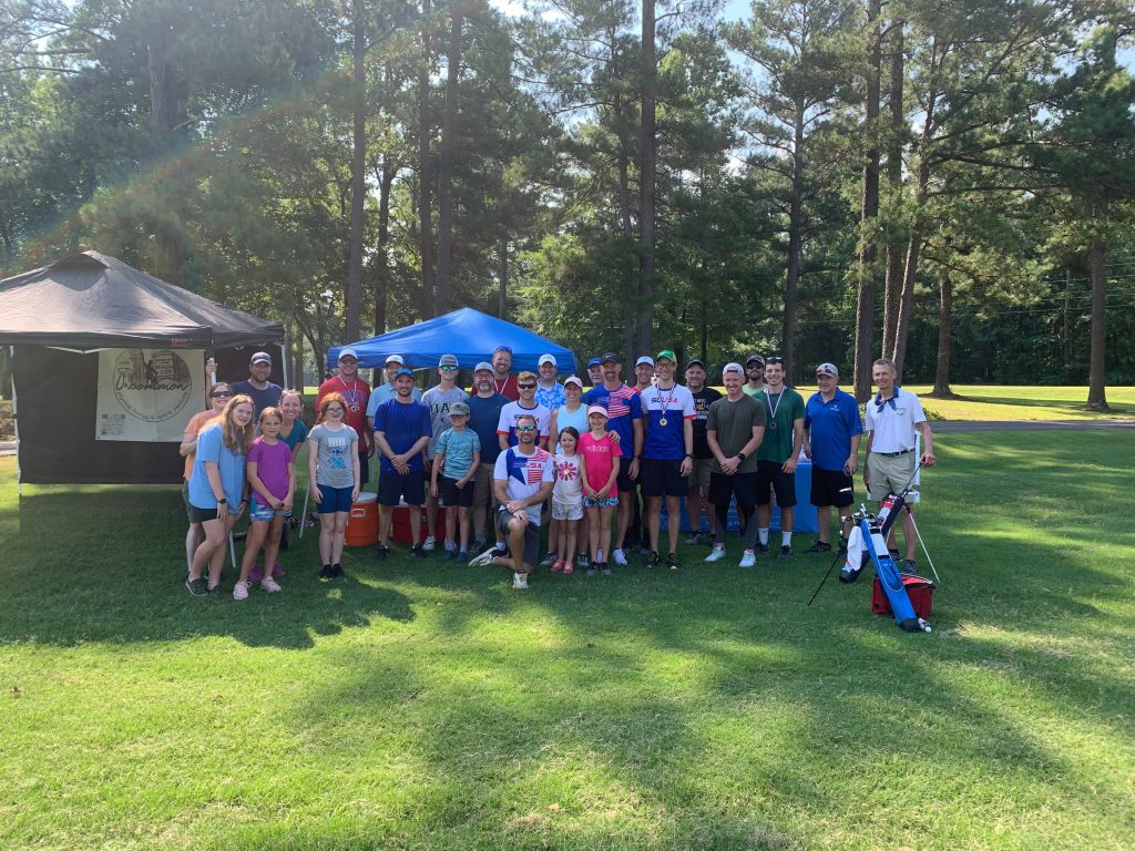 Men and women on a golf course