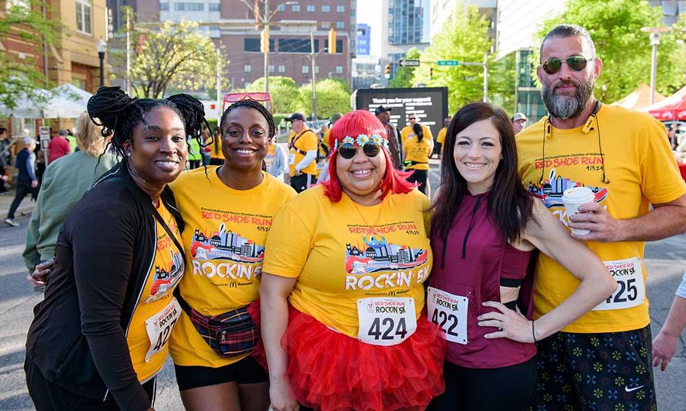 Four runners at a 5K