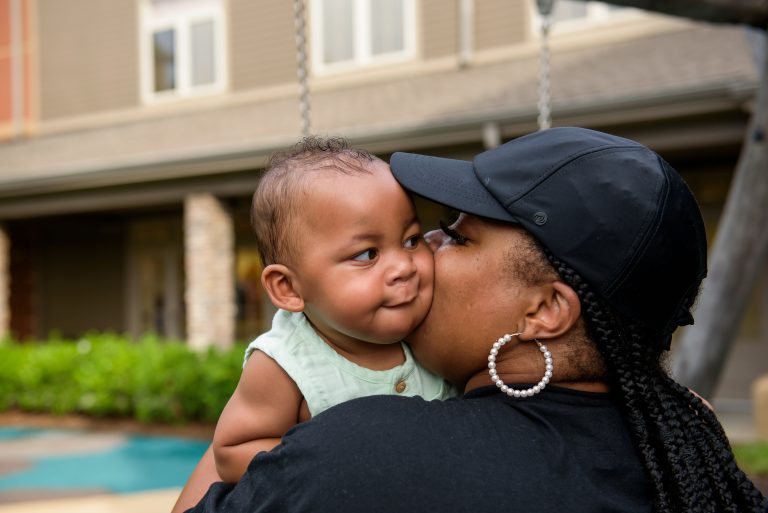 Mom holding baby