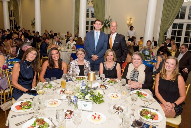 Guests around a table at the Heart of the House Gala