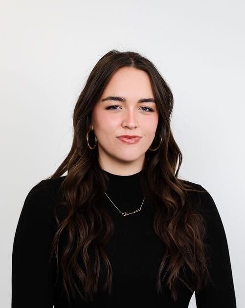 A woman poses for the camera