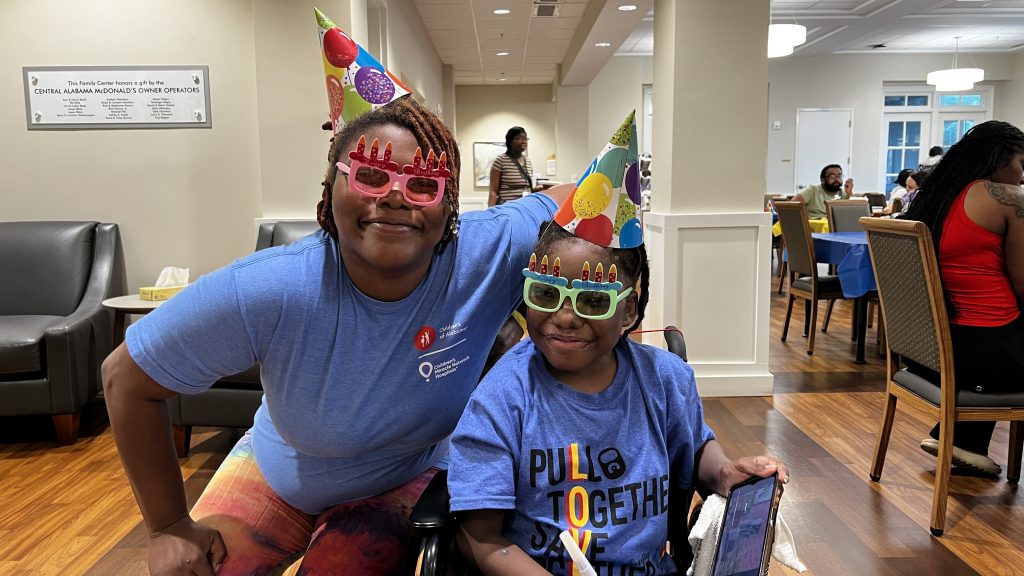 Family with birthday hats