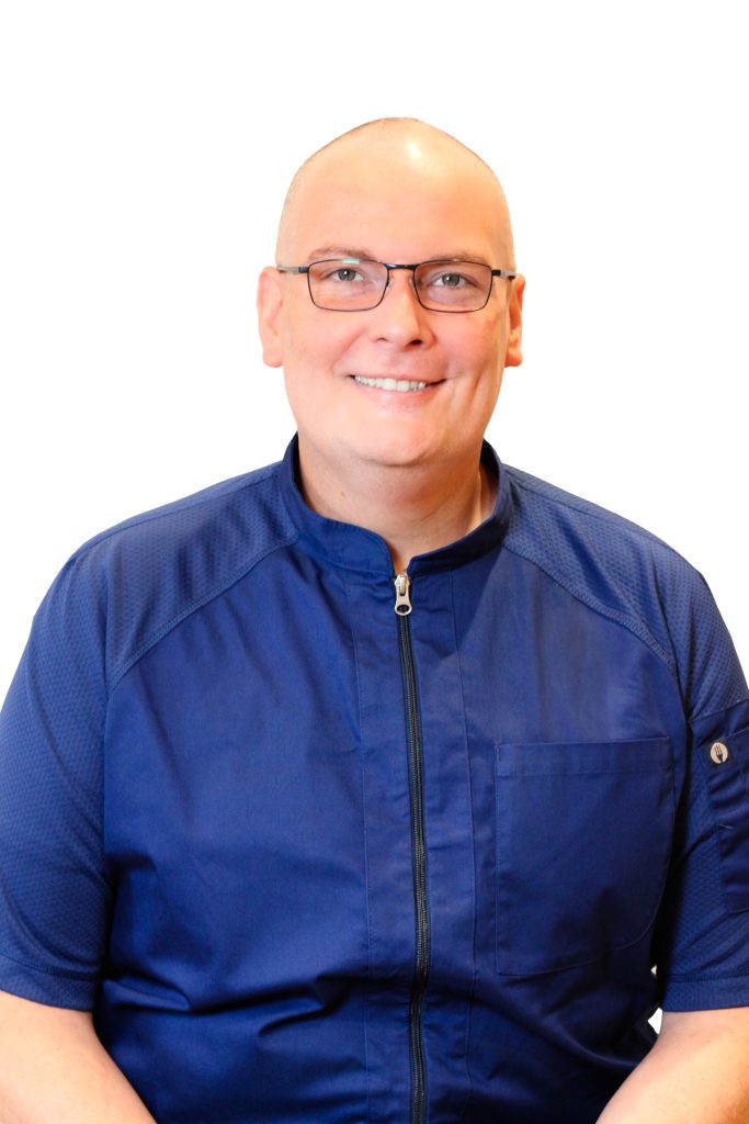A man poses for a photo