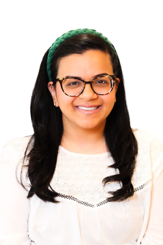A woman poses for a photo