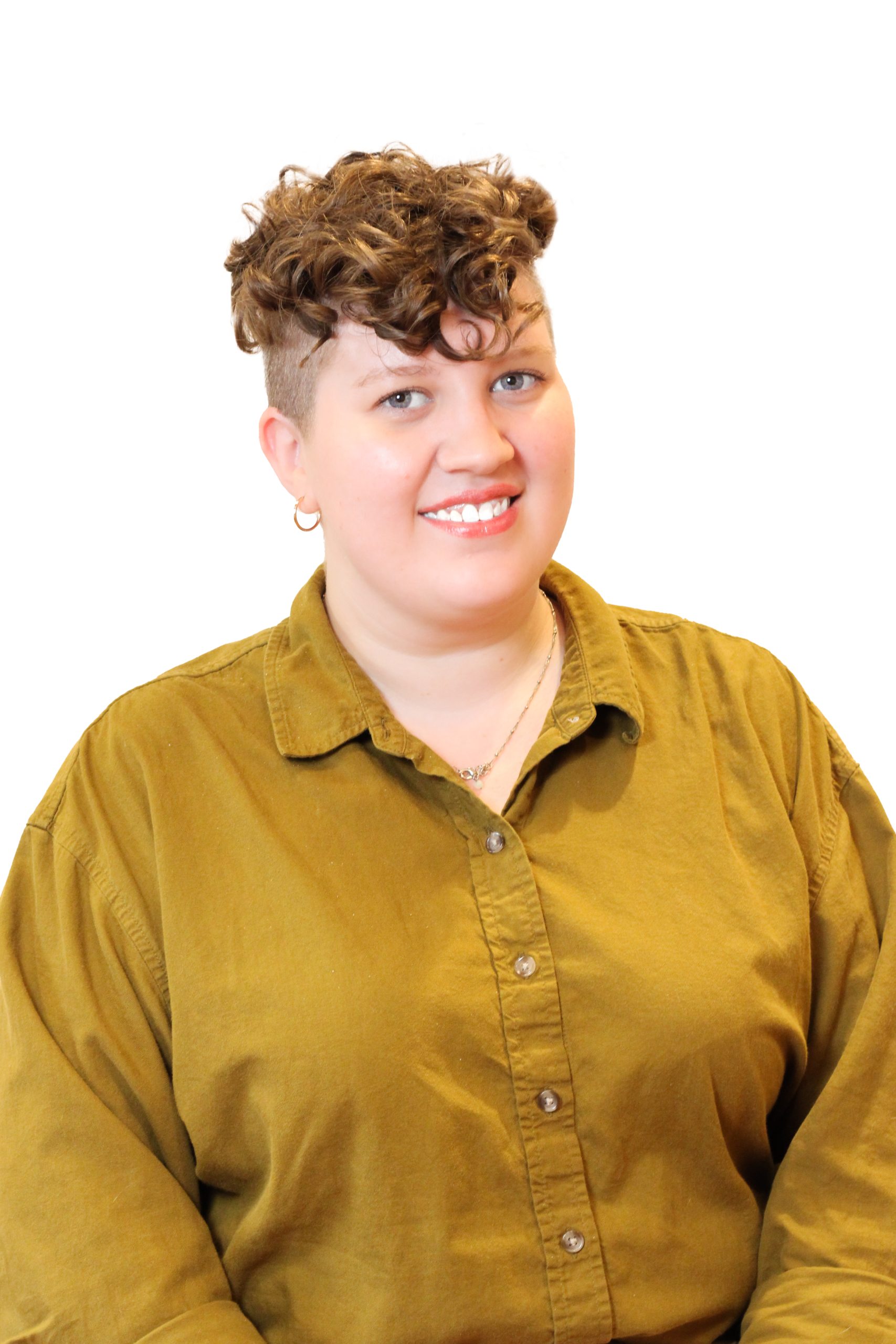 A woman poses for a photo