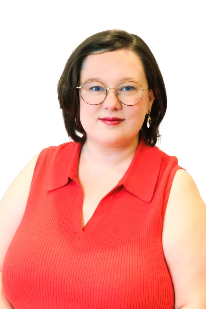 a woman poses for a photo