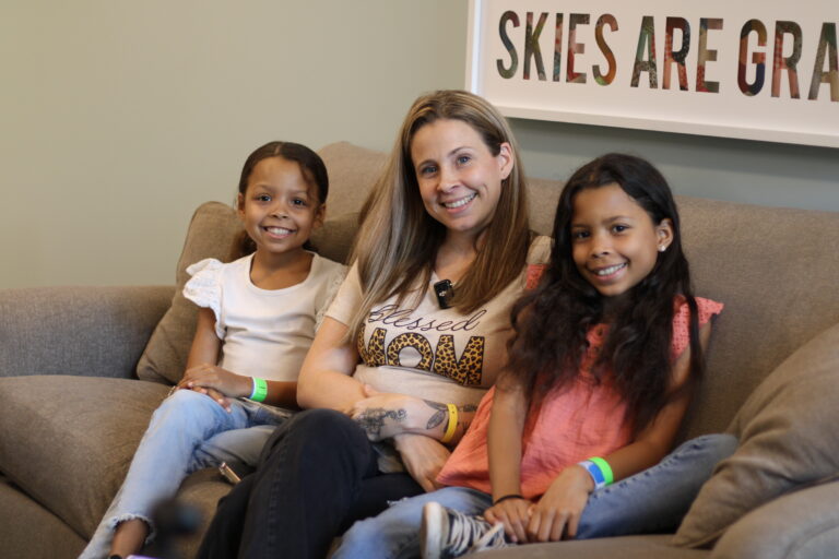 Family sitting on couch