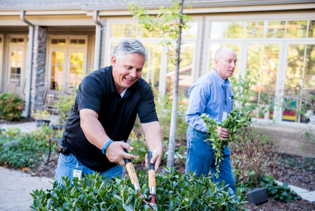 Volunteers doing yard work